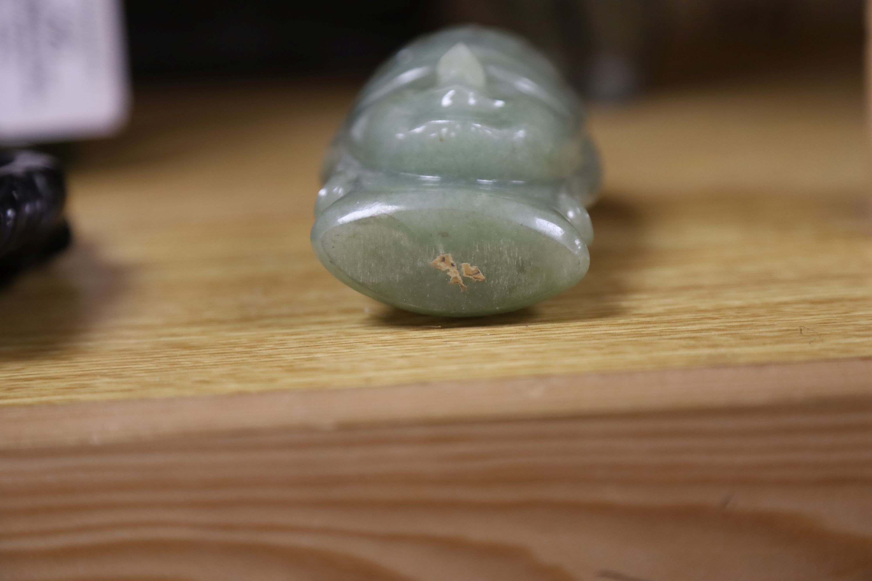 A group of Inuit and African stone carvings 19cm